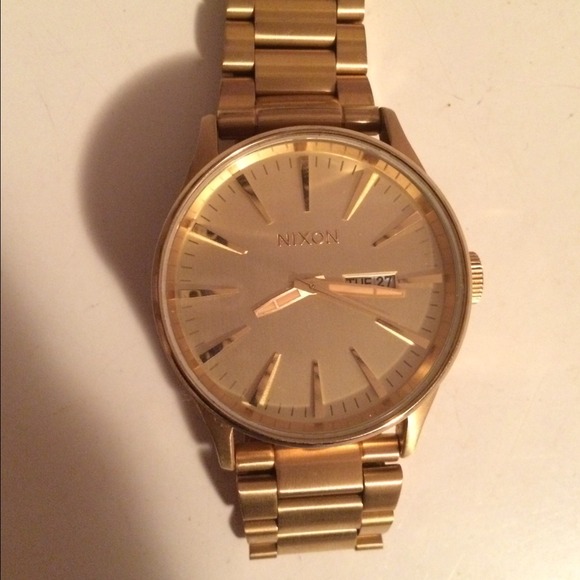 Gold Nixon watch
