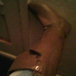 Brown knee high leather boots