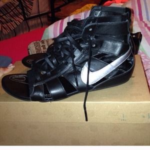 Black and silver Nike gladiator sandals