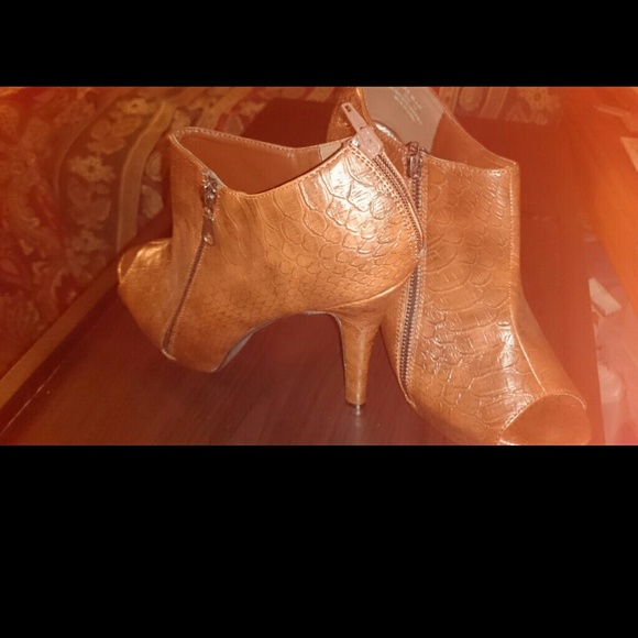 New never worn. Brown Booties with 4 inch heel - Picture 2 of 2
