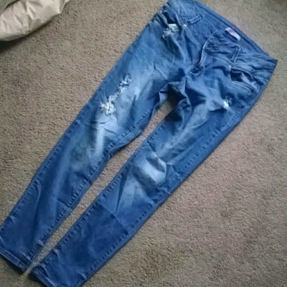 High wasted lightly ripped jeans.