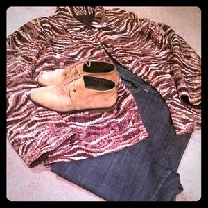 Quilted-like reversible animal print jacket.