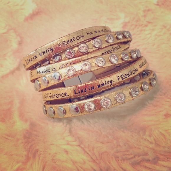 Metallic Gold Humanity Bracelet with Crystals
