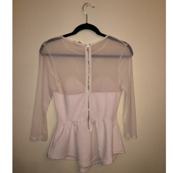 White peplum blouse. - Picture 2 of 3