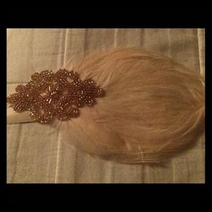 Feather head band never got to wear brand new