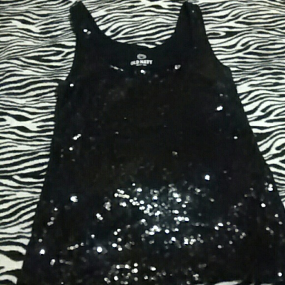 Sequined tank top. Black in color.