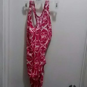 Swin suit. Pink white and dark pink.