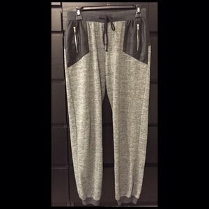 Heathered joggers with faux leather detail