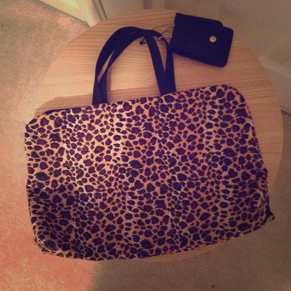 Large cheetah print cosmetic travel case!