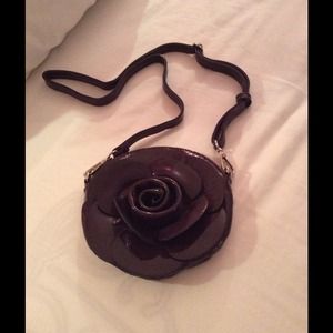Brand new purple rose cross body bag!
