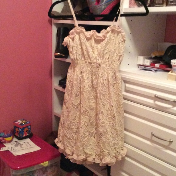 Gorgeous cream colored lace dress with ruffles!