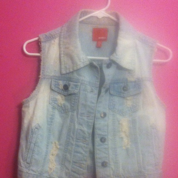 Light wash distressed denim vest