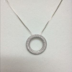 Tanzanite diamond circle of life necklace.