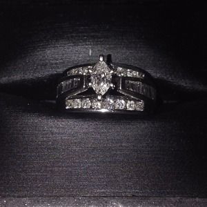 14 kt white gold engagement ring. 1/2 tw diamonds.