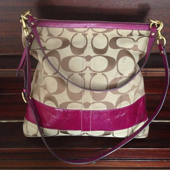 Signature Coach bag with purple patent leather