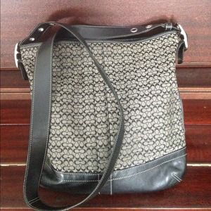 Signature Coach purse with leather trim