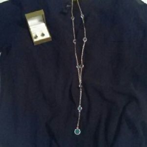 Gold earrings and long necklace