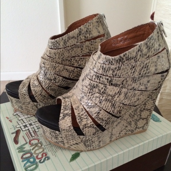 Gently worn Jeffrey Campbell ivory python leather