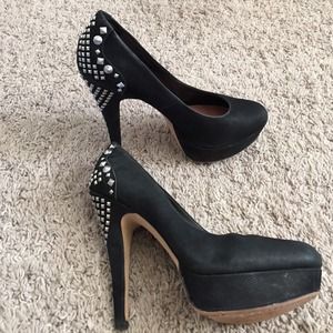 Studded black platform pumps