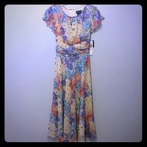 Tea length flowery, flirty dress