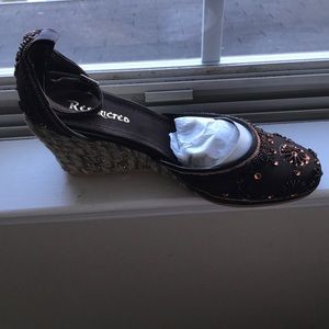 Restricted Genie Brown Wedge.