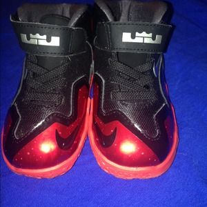 Red and black Lebron James sneakers