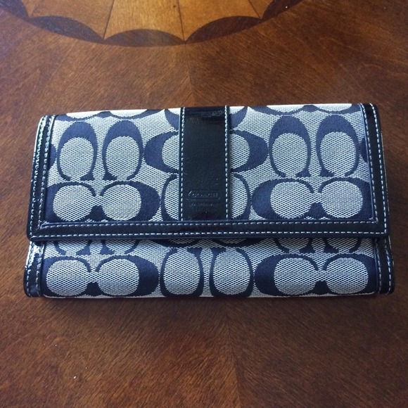 Black Coach "C" logo wallet.