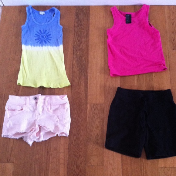 KidsTwo tank tops and pink shorts and black capris