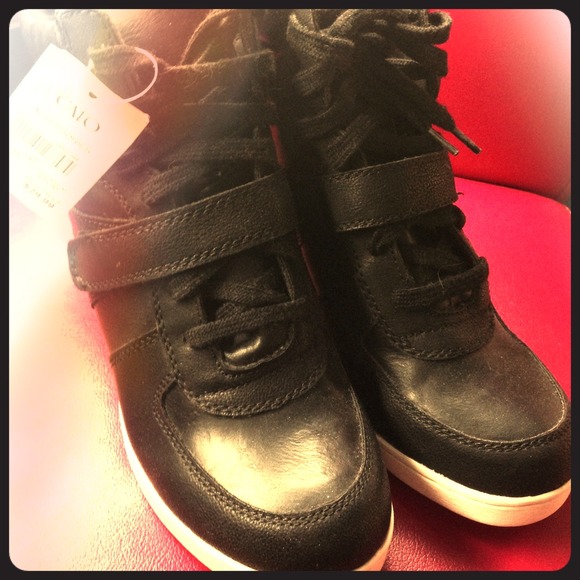 Black faux leather wedge sneakers