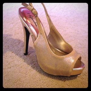 Gold peep toe stilettos