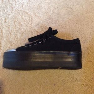 Platform sneakers by Jeffrey Campbell