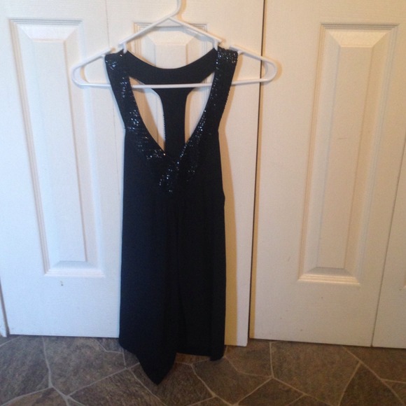 DEB tank top with sparkle neck line.