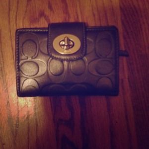 Silver coach wallet