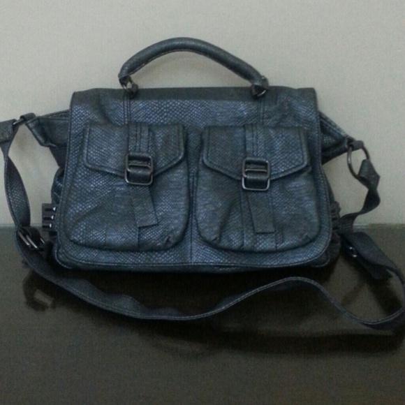Gun metal gray saddle bag styled purse.