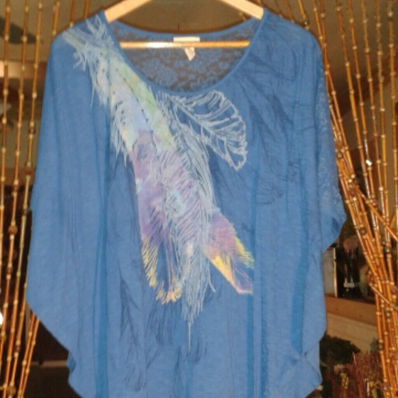 Torrid blue feather top with lace back.