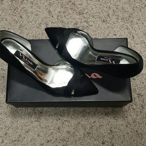 Kitten heel, black satin shoe