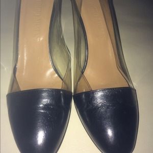 Black leather pumps