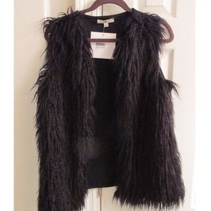 Black faux fur vest