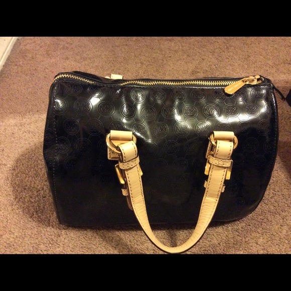 Michael kors authentic purse black & gold