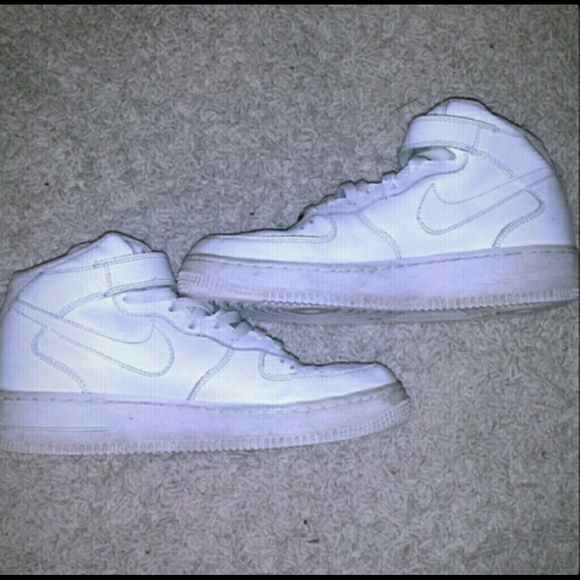 White high top Nike Air Force ones