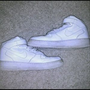 White high top Nike Air Force ones