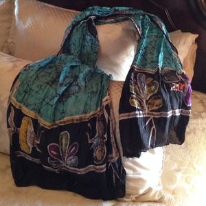 100% silk scarf with fish and flower pattern.