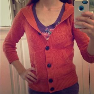 Orange knit sweater with hood