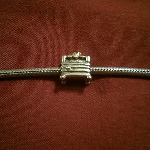 Authentic Pandora sterling silver and gold charm