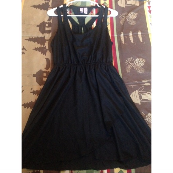Black knee length dress.