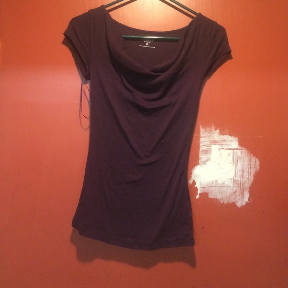 Formal dark purple blouse with a neck fold.
