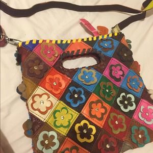 A genuine leather boho cross body bag