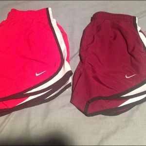 Two pairs of Nike track shorts