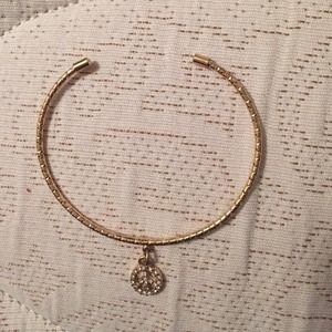 Lauren Conrad gold peace bracelet