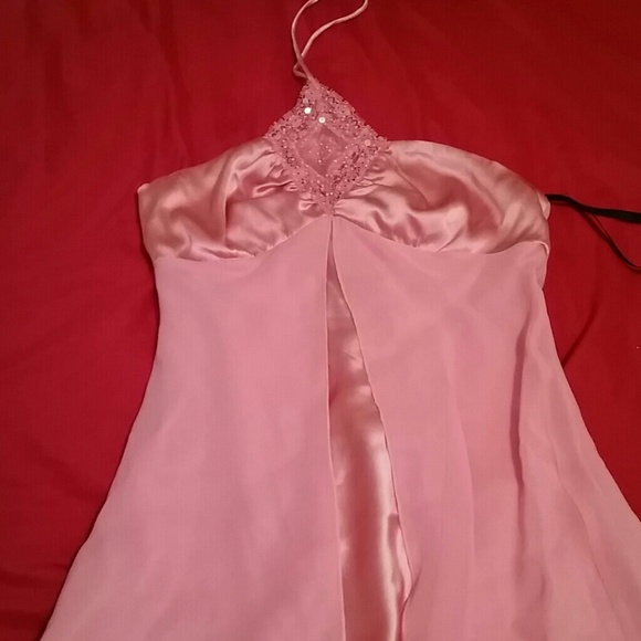 Pink halter style top with details in the front. - Picture 1 of 4